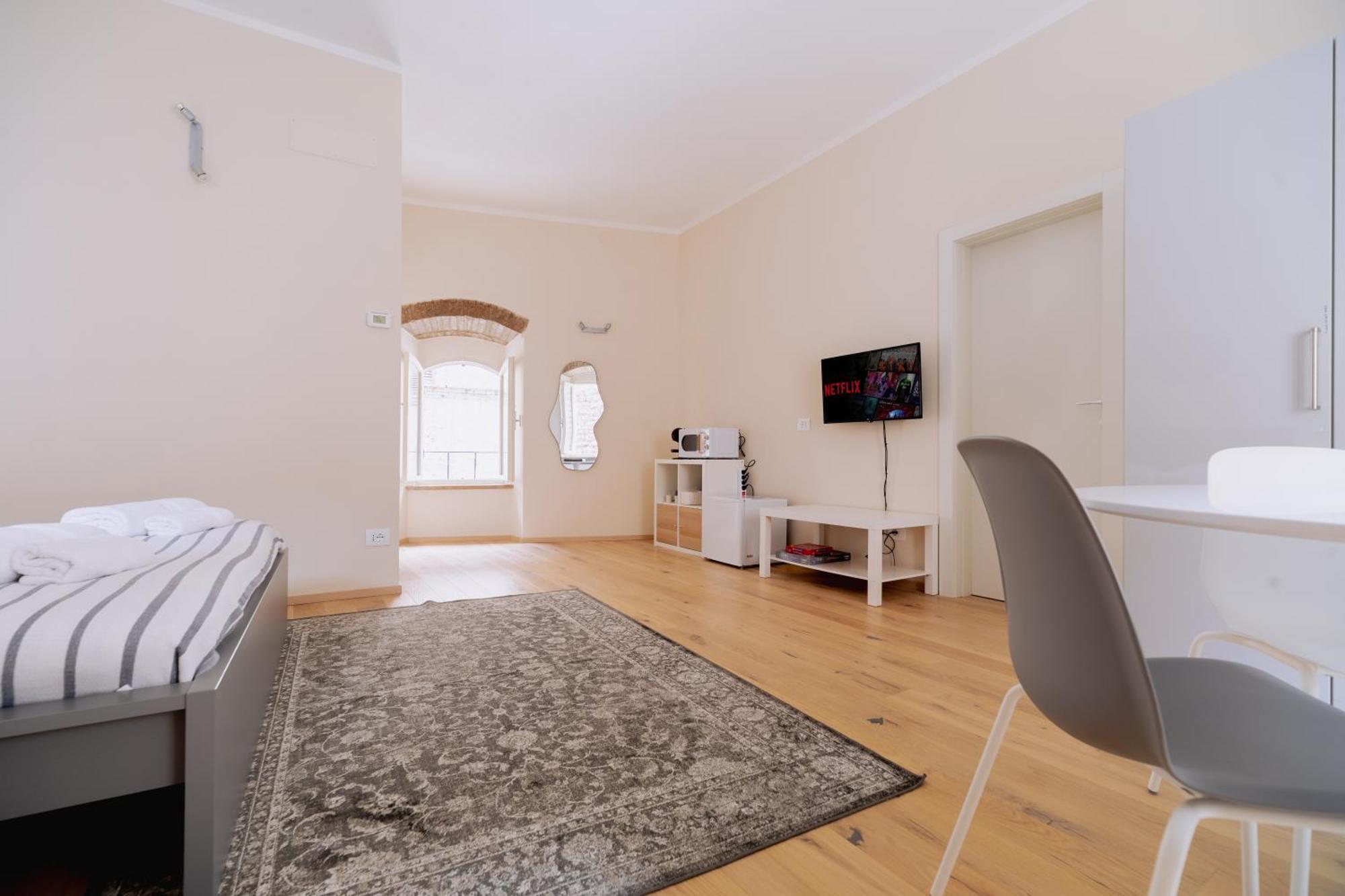 Suite Comunicanti, Tra Antico E Moderno Assise Extérieur photo