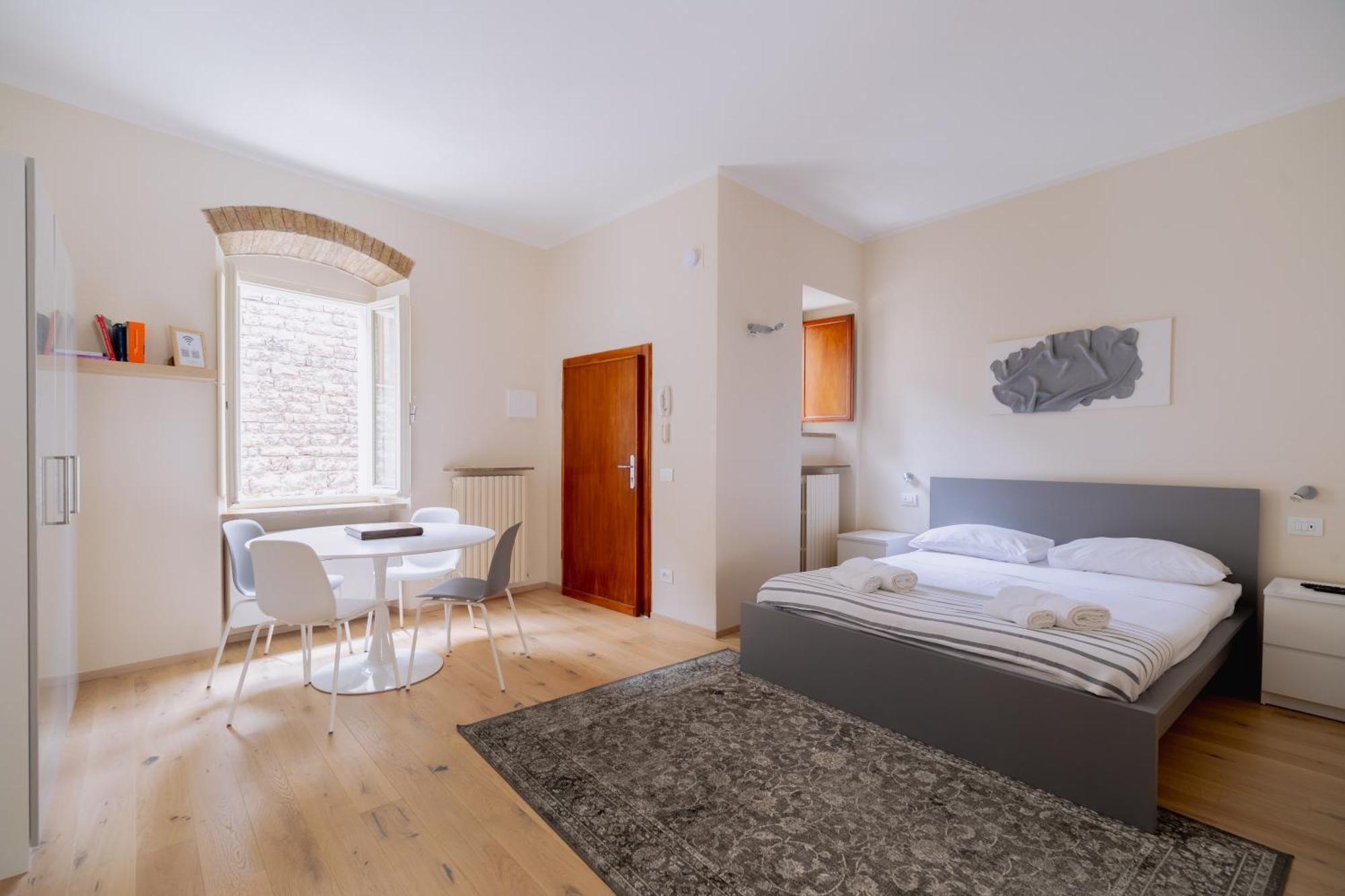 Suite Comunicanti, Tra Antico E Moderno Assise Extérieur photo