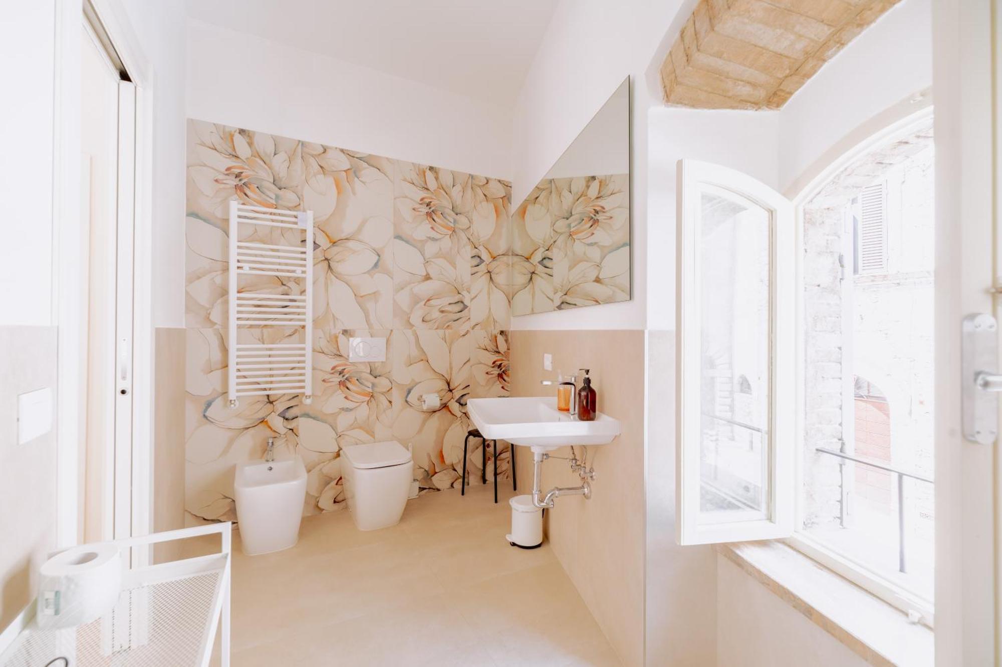 Suite Comunicanti, Tra Antico E Moderno Assise Extérieur photo