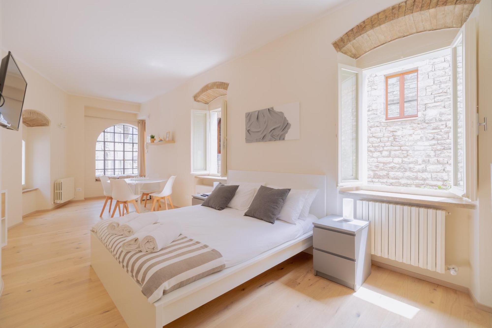 Suite Comunicanti, Tra Antico E Moderno Assise Extérieur photo